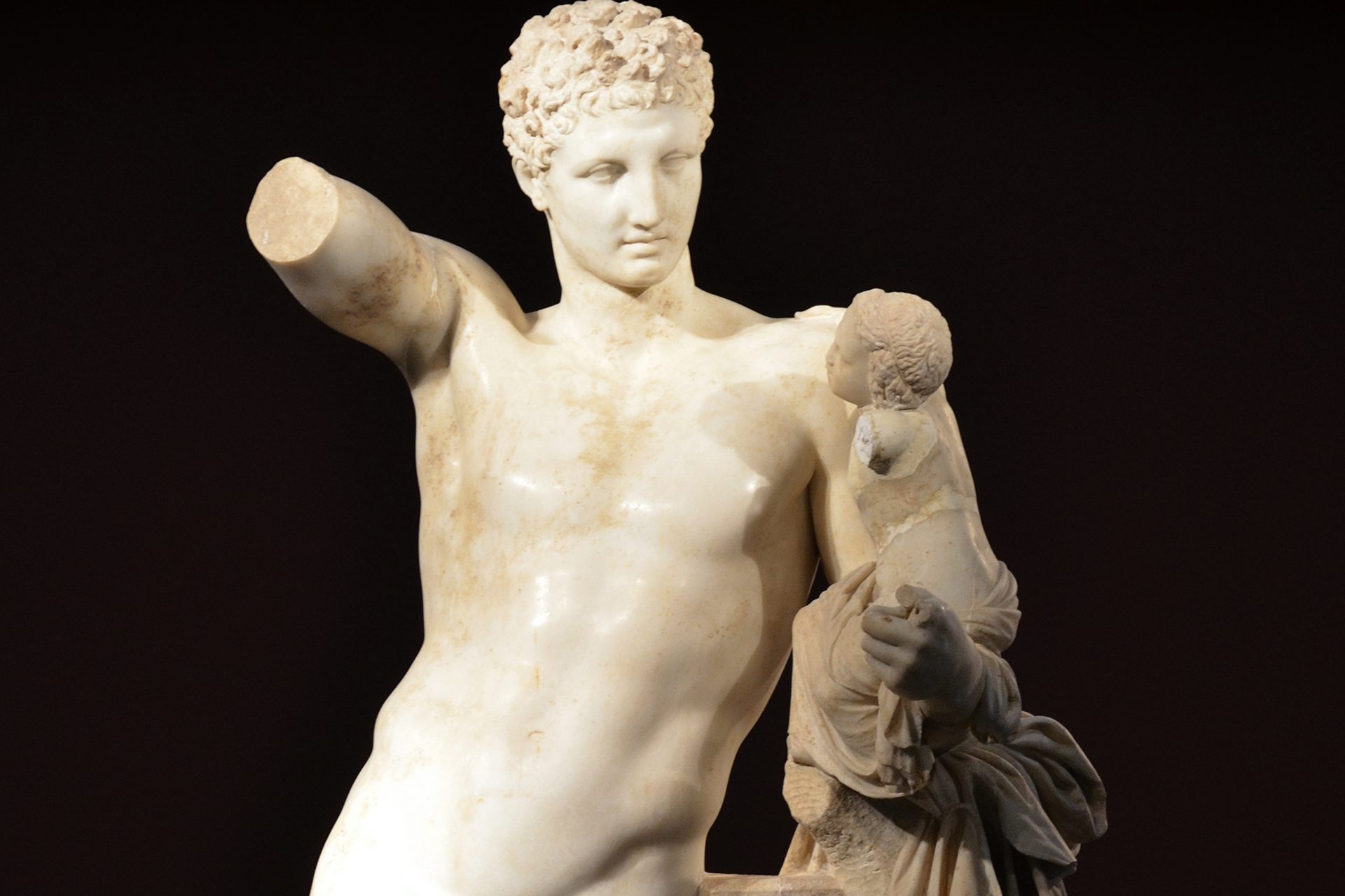 The marble Hermes carrying the infant Dionysus, attributed to Praxiteles, in the Archaeological Museum of Olympia