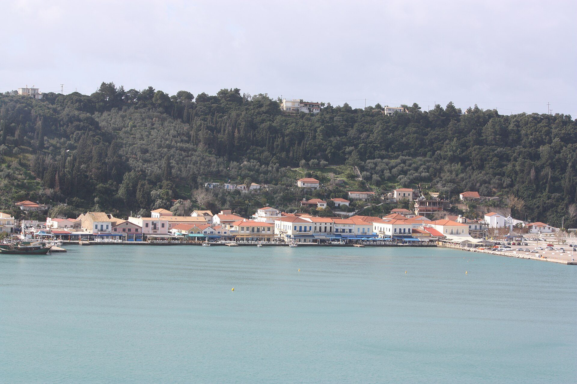 The wooded coastline and harbour front of Katakolon seen from the sea